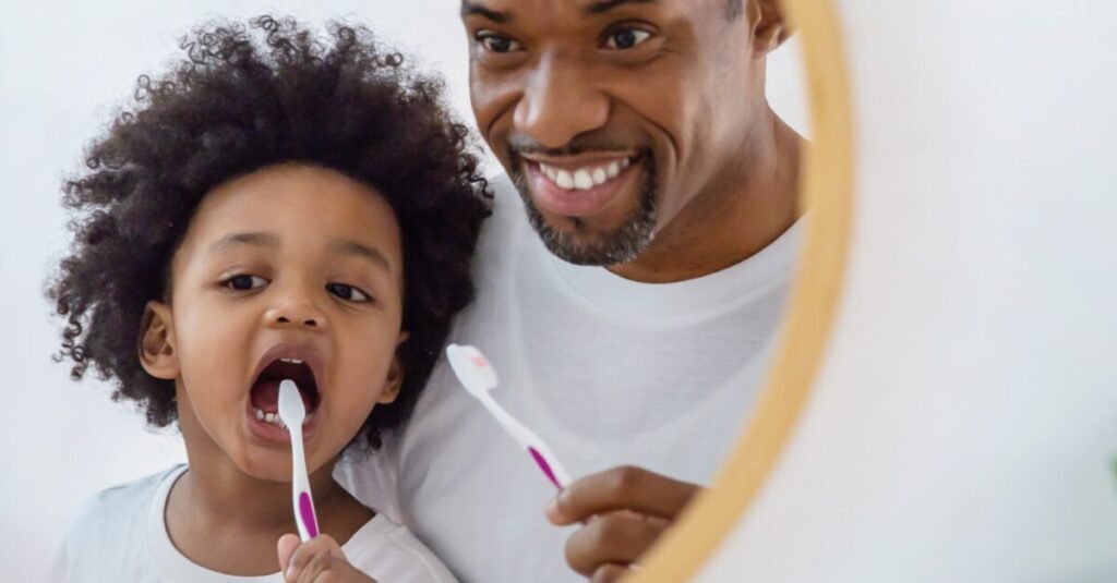 Child brushing his teeth 1200x627