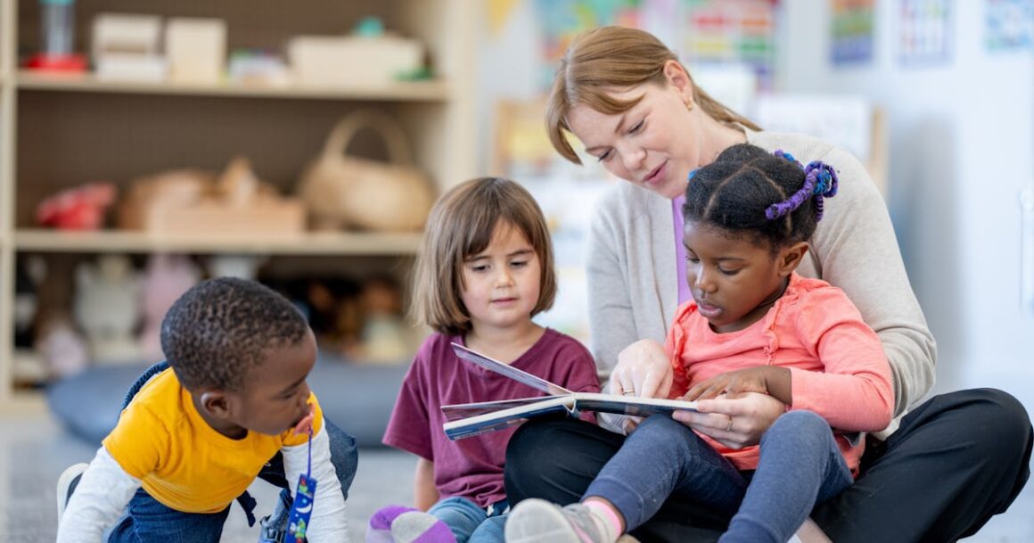 a daycare teacher sits