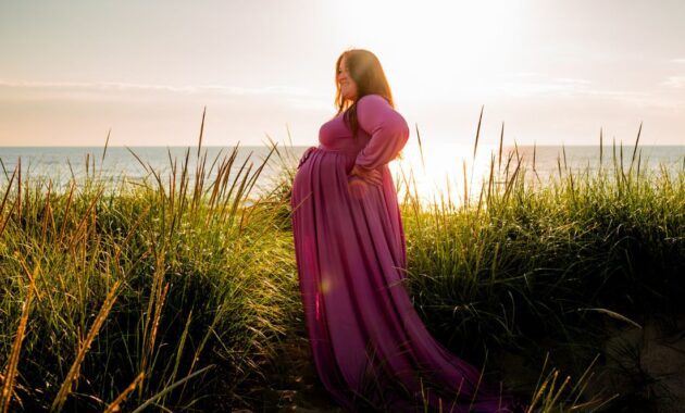 plus size woman with a plus size pregnancy bump