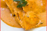 Giorgios Homemade Salmon Ravioli in a Creamy Tomato Sauce.jpg