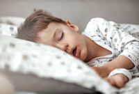 Little blond boy sleeping in his bed. 1223560129 1258x839.jpeg
