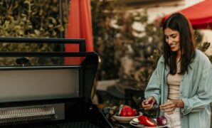 smiling woman cutting the.jpg