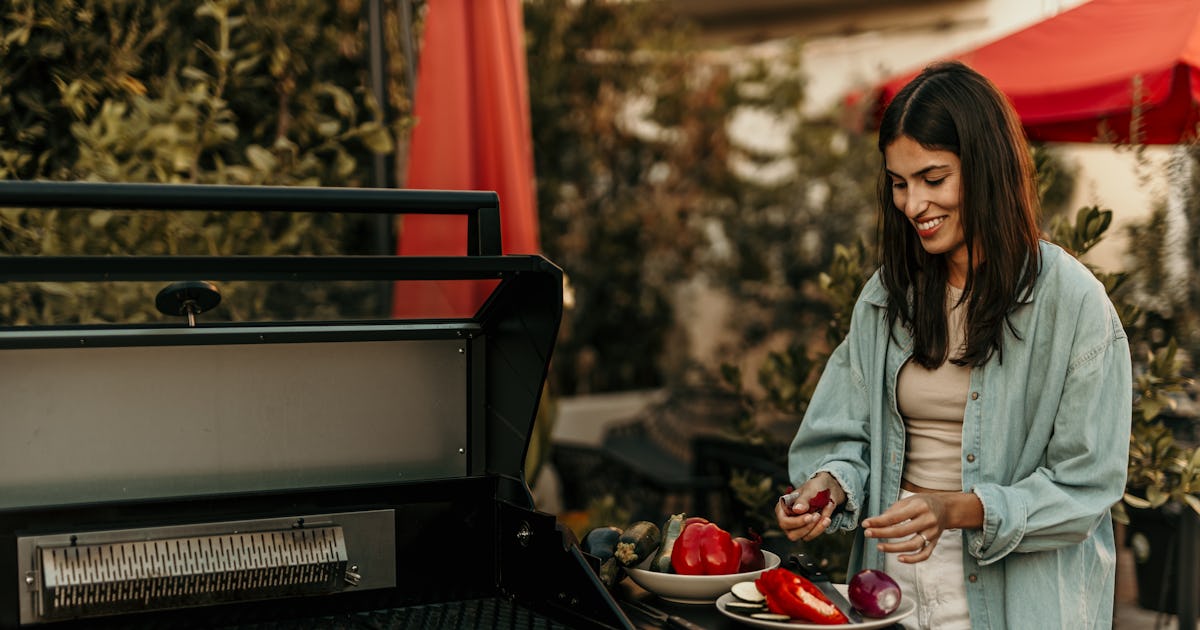 smiling woman cutting the.jpg