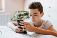 teenager boy using cell.jpg