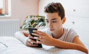 teenager boy using cell.jpg