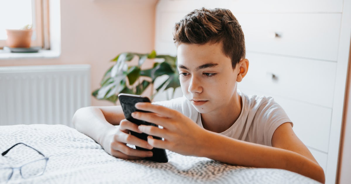 teenager boy using cell.jpg