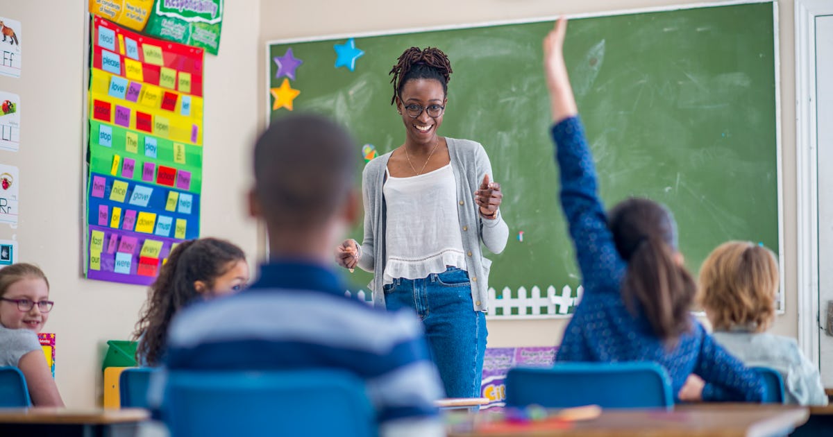 a teacher is standing.jpg