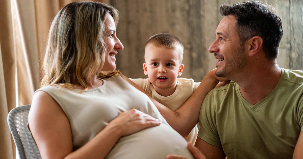 happy pregnant woman whit.jpg
