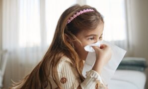 sick girl with tissues.jpg