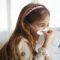 sick girl with tissues.jpg