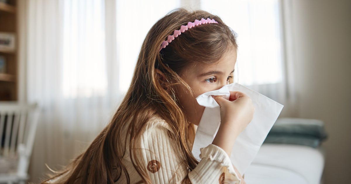 sick girl with tissues.jpg