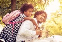Father and Daughter Smiling Back to School Parent.jpg