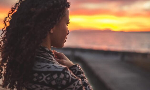 Thoughtful evening mood with a young afro latino woman 1152605834 1256x838.jpeg
