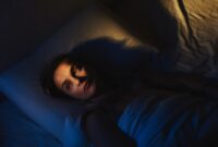 a woman lies awake.jpg