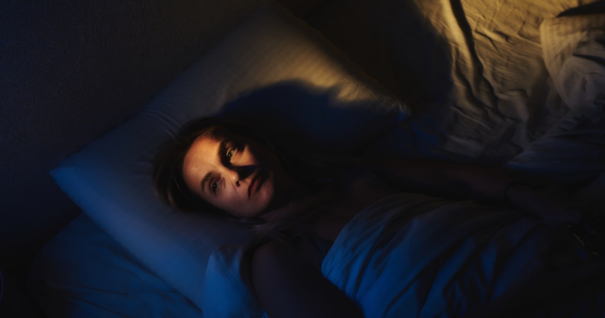 a woman lies awake.jpg