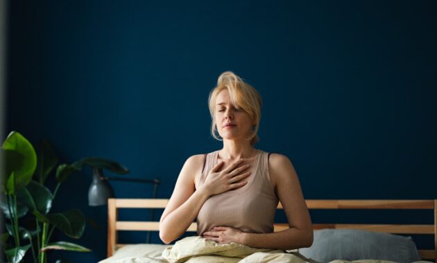 happy woman in pyjamas.jpg