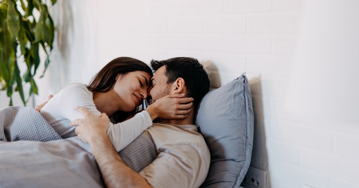 happy young couple cuddling.jpg