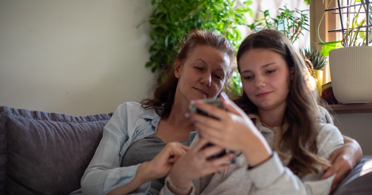 mother daughter are sitting.jpg