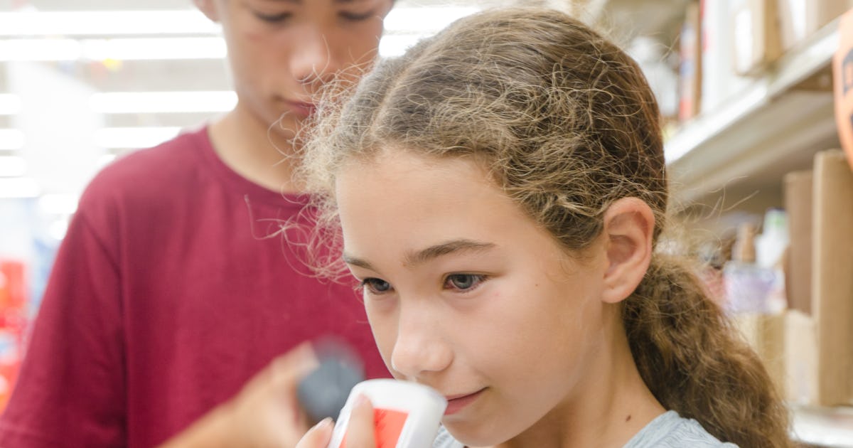 teenager girl smelling a.jpg