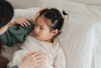 worried asian mom comforting.jpg