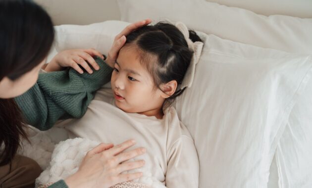 worried asian mom comforting.jpg