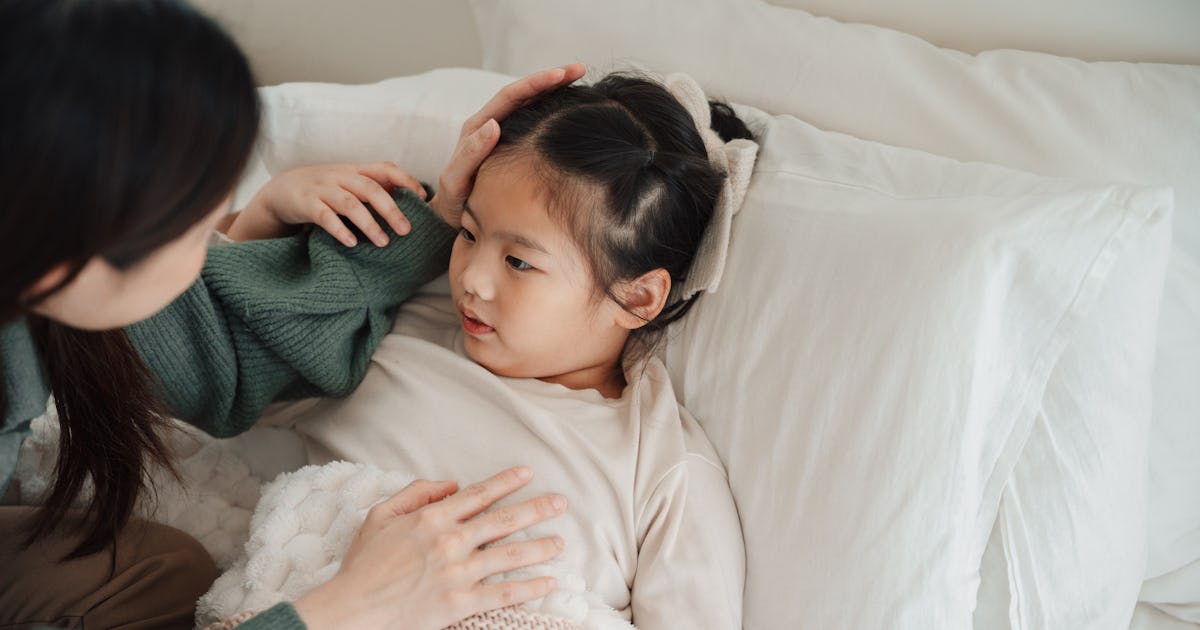 worried asian mom comforting.jpg