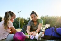 young woman tying shoelaces.jpg