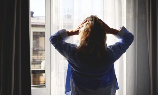 a woman standing by.jpg