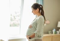 happy hopeful pregnant woman.jpg