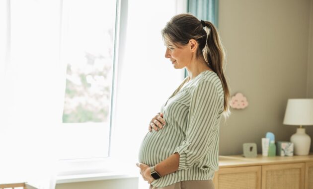 happy hopeful pregnant woman.jpg