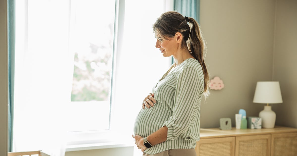 happy hopeful pregnant woman.jpg