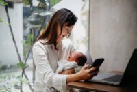 Woman working at home while taking care of her newborn baby 1550818806 2124x1416.jpeg