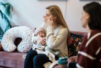 a woman holds her.jpg a woman holds her.jpg