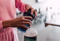 woman preparing protein shake.jpg