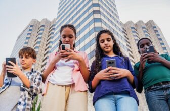 teenage friends using mobile.jpg