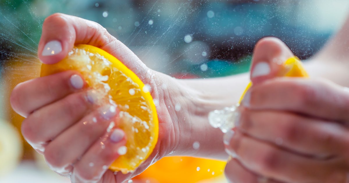 woman squeezing the juice.jpg