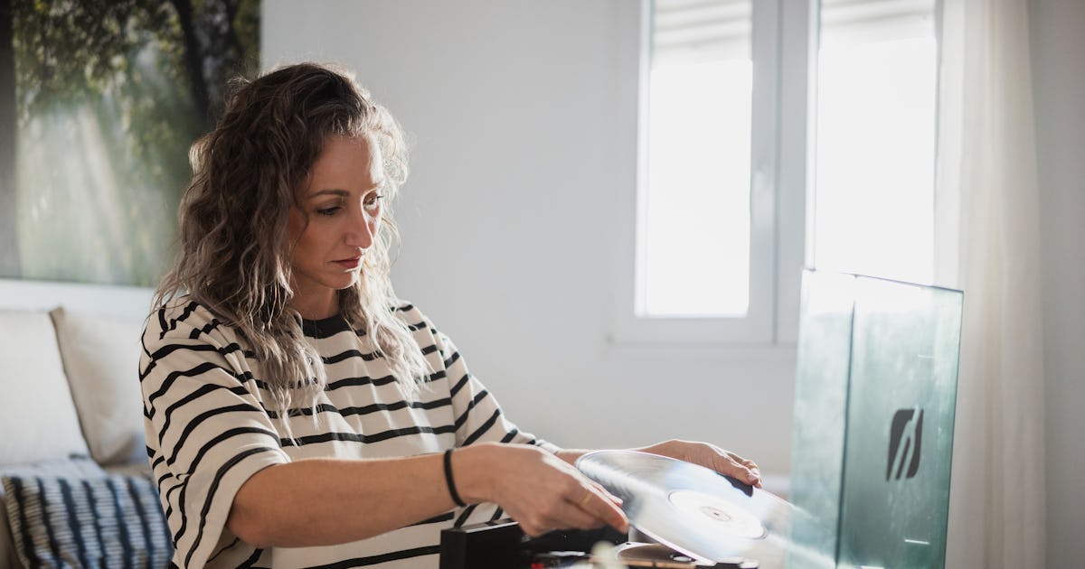 woman carefully placing a.jpg