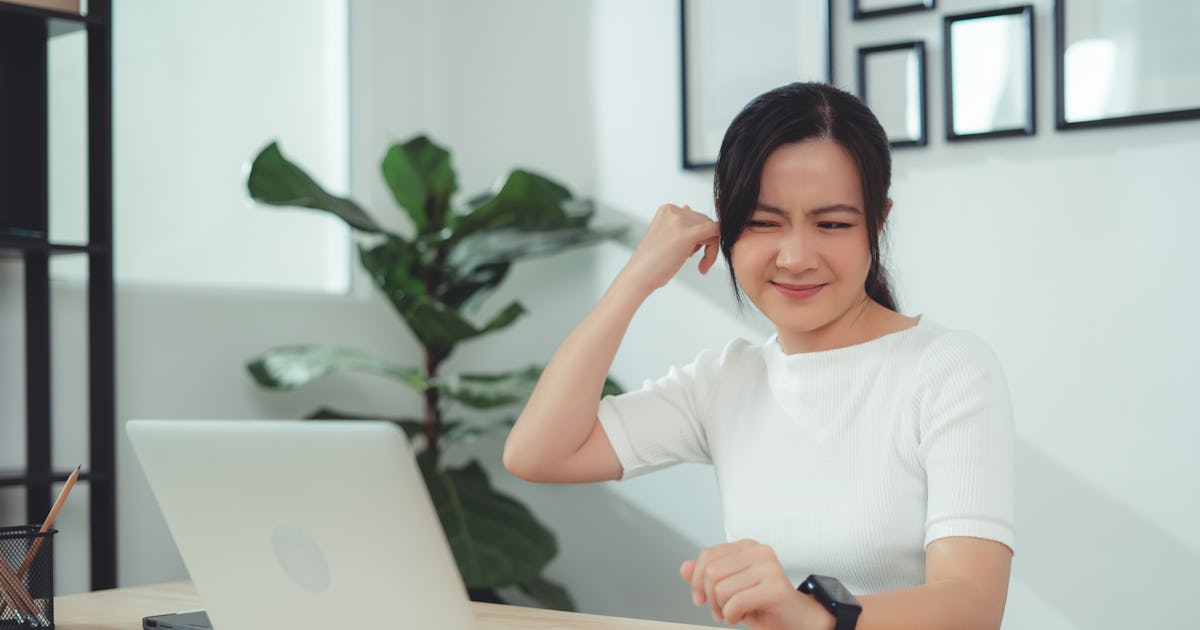 asian woman itching from.jpg