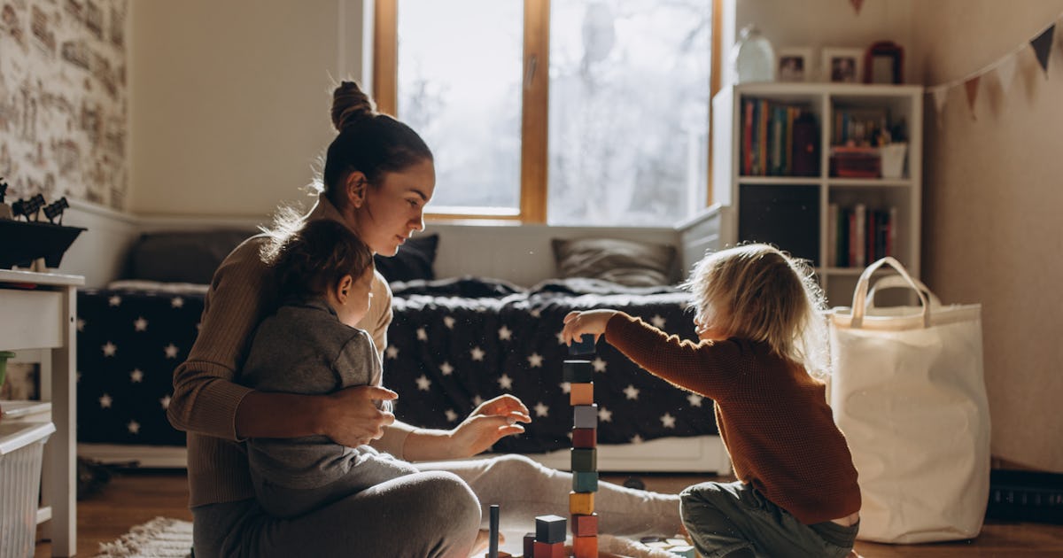 young mother playing with.jpg