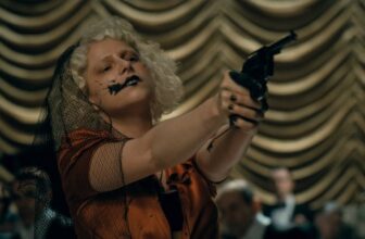 The Bride review Jessie Buckley with gun 3.jpg