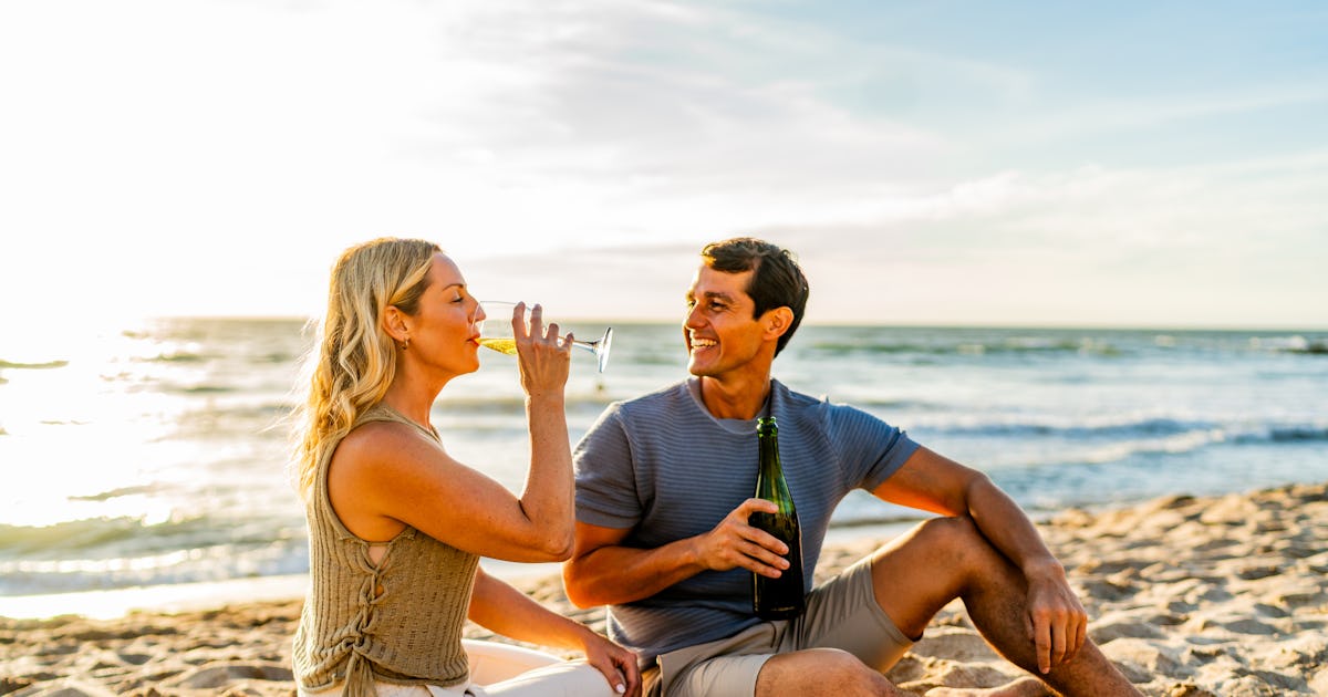 couple talking drinking wine.jpg