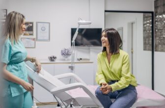 female cosmetologist with talking.jpg