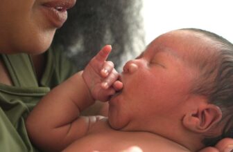 kissing a newborn baby.jpg