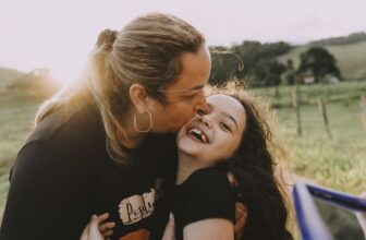 mother hugging daughter on.jpg
