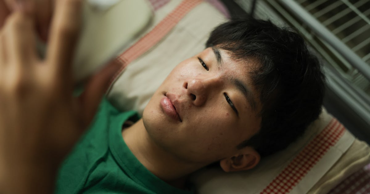 while in bed asian.jpg