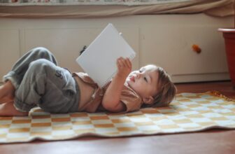 toddler lying on the.jpg